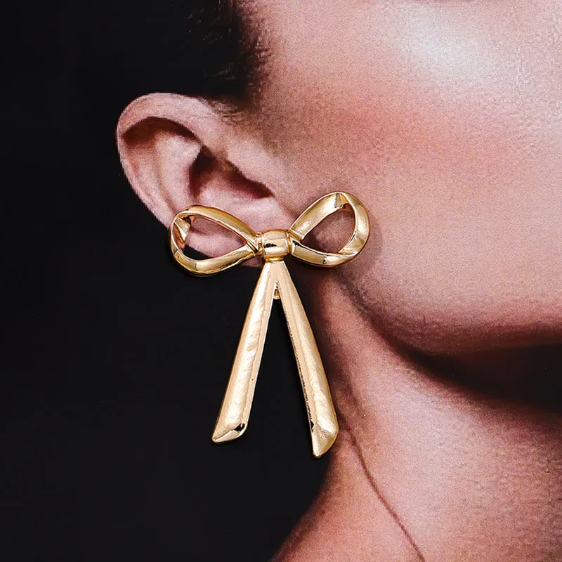 Exaggerated Metal Ribbon Knot Earrings with a Touch of Vienna Glam