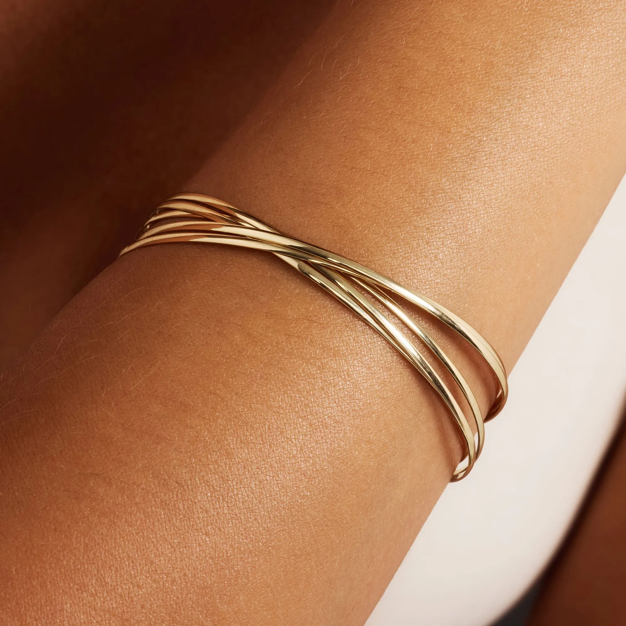 Rivoli Méline 14 karat gold bangles with 5 bracelets